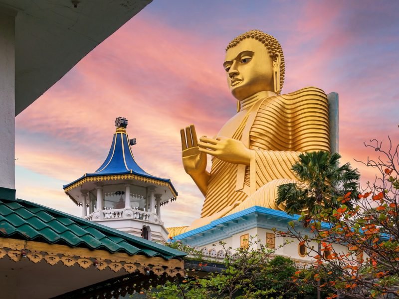 Golden Buddha statue in Dambulla Temple in Sri Lanka