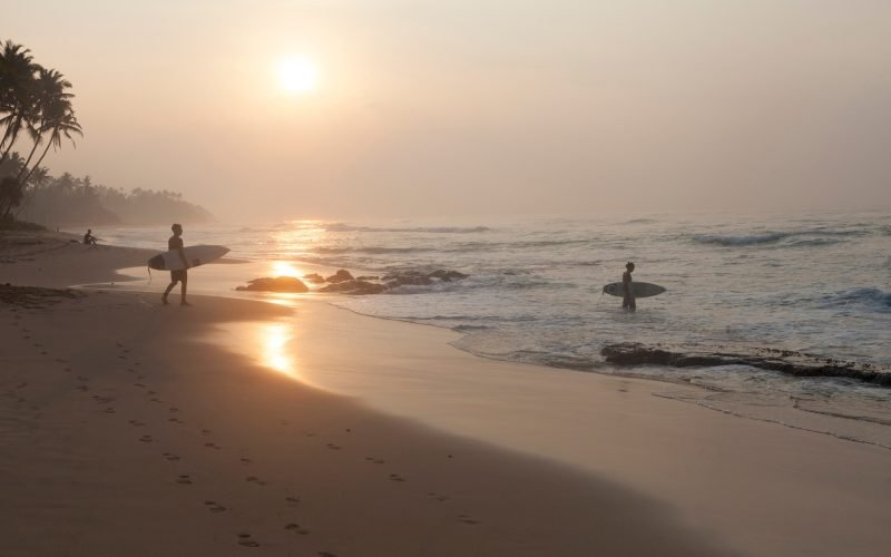 Sri Lanka, Mirissa, sunrise, beach with surfer